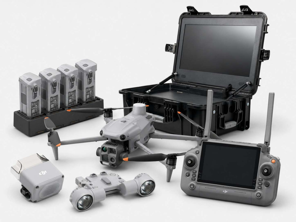 DJI Matrice 4T thermal drone bundle with spotlight, speaker, rugged monitor case, remote controller, four batteries, and charging hub.