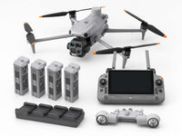 DJI Matrice 4T thermal drone spotlight bundle with remote controller, four batteries, charging hub, and dual-light spotlight accessory.