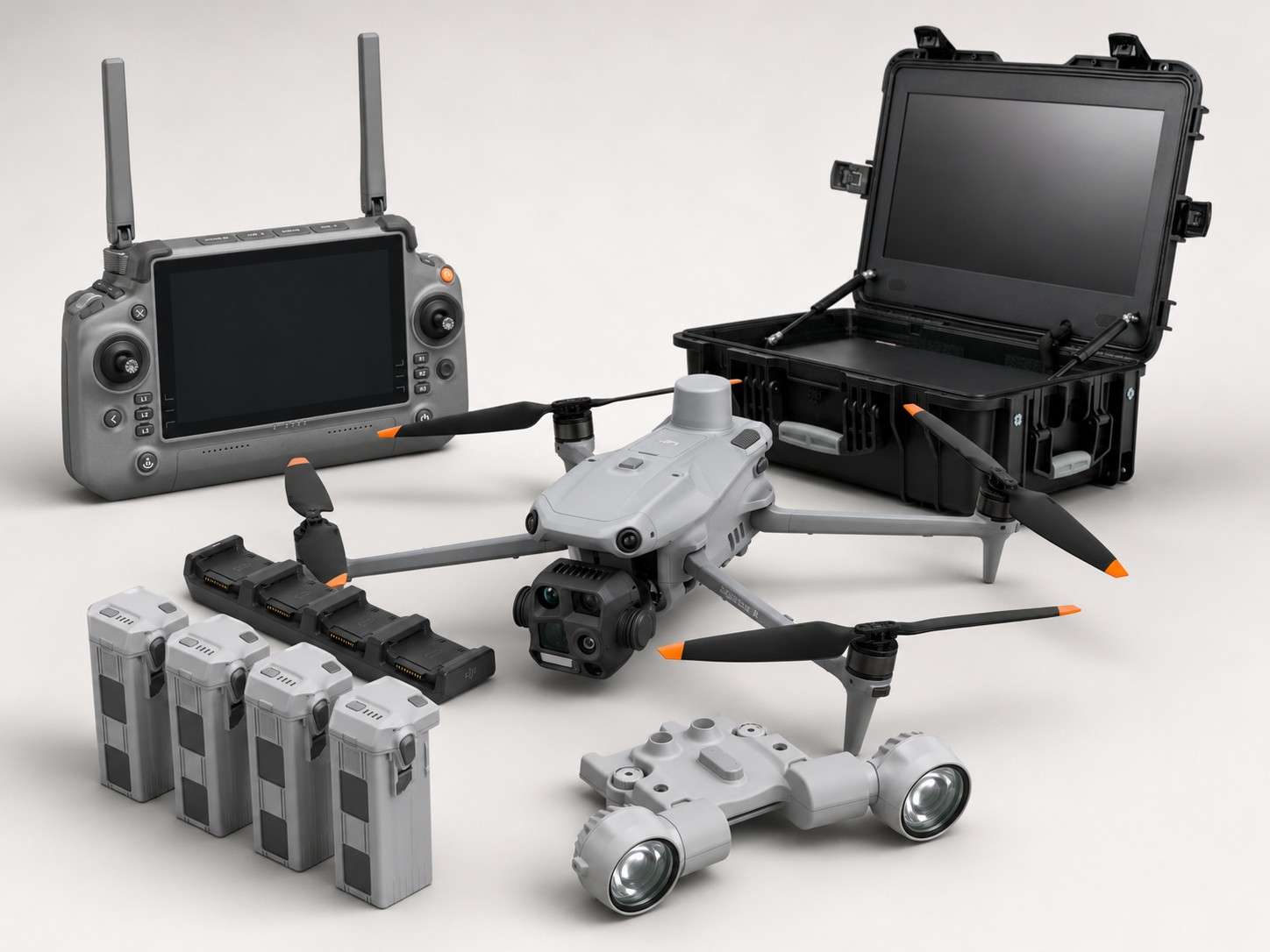 DJI Matrice 4T thermal drone bundle with spotlight, remote controller, four batteries, charging hub, and rugged field monitor case.