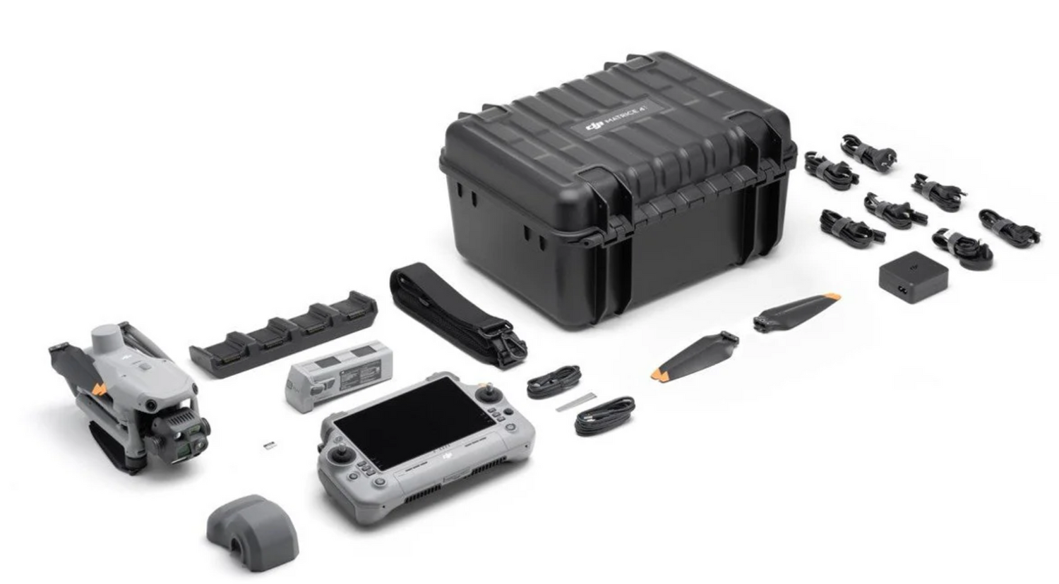 DJI Matrice 4T thermal drone complete kit contents laid out including folded aircraft with 640x512 thermal camera RC Plus 2 enterprise controller flight battery 100W charging hub storage case shoulder strap propellers gimbal protector cables and microSD card best price Covert Drones
