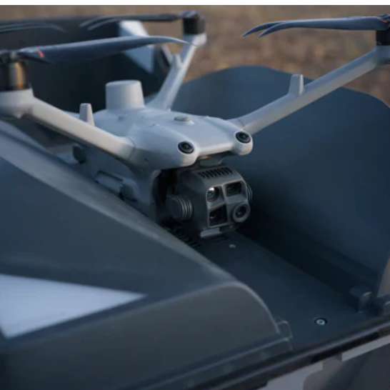 DJI Matrice 4TD drone seated in DJI Dock 3 autonomous docking station with thermal gimbal and sensors visible