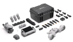 DJI Matrice 4T deer recovery kit laid out showing drone controller four batteries hard case propellers spotlight module and all included accessories